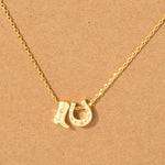 Horseshoe & Boot Necklace Gold