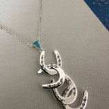 Four Horseshoe Necklace