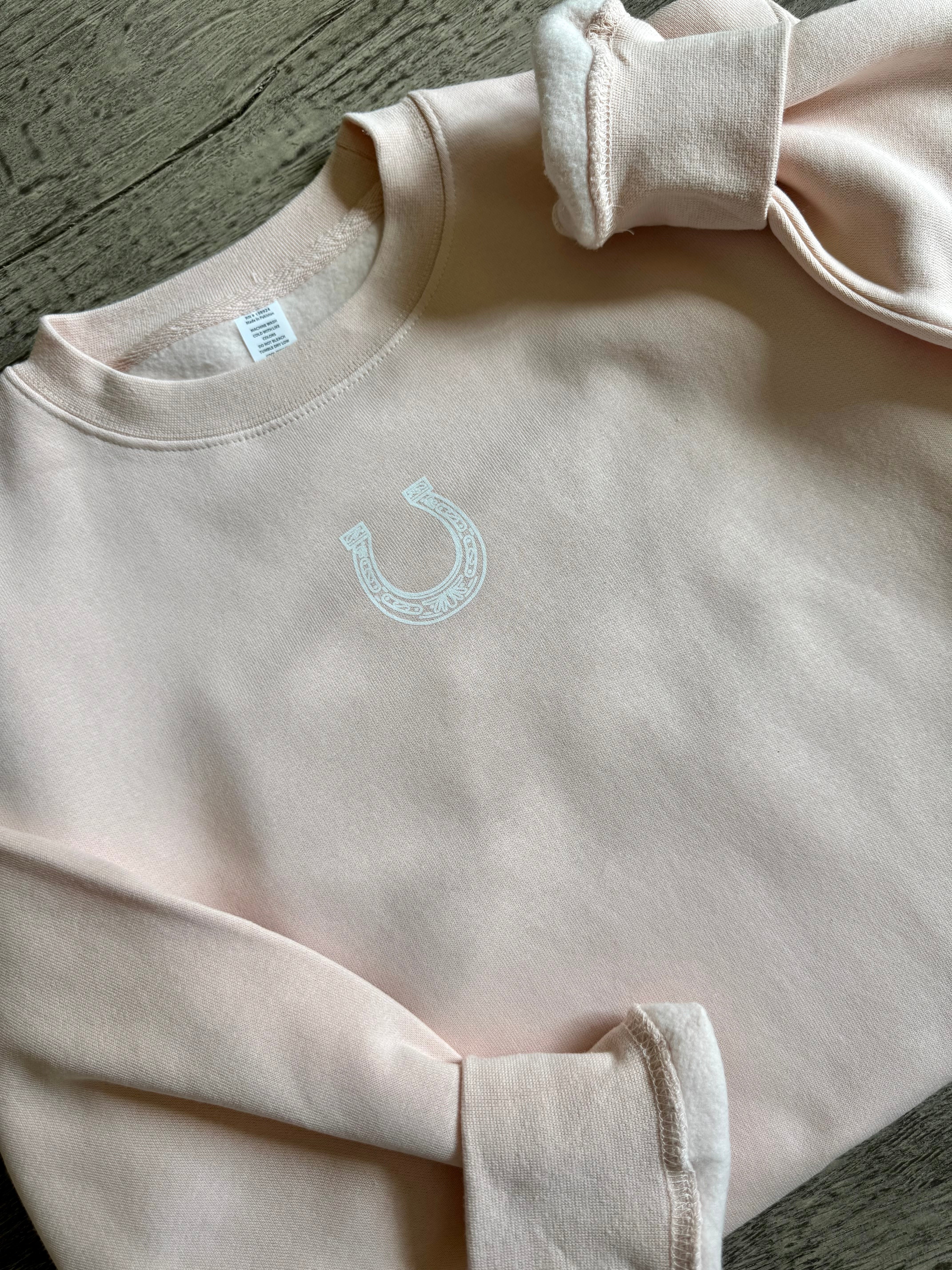 blushing horseshoe sweatshirt