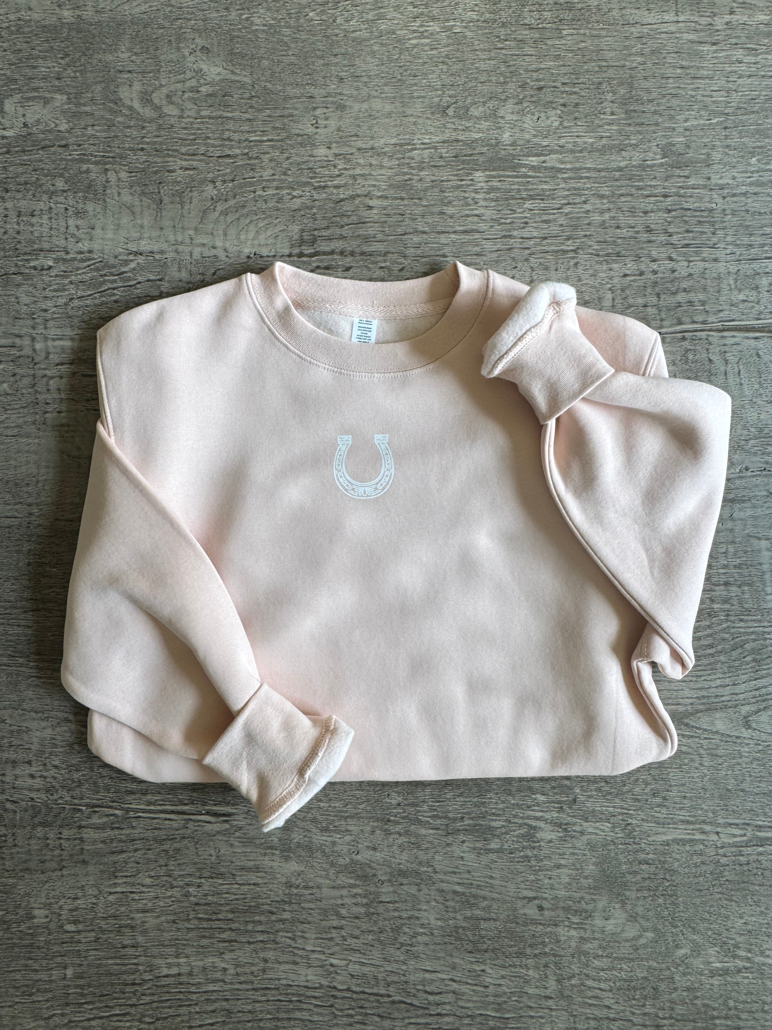 blushing horseshoe sweatshirt