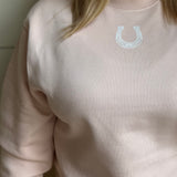blushing horseshoe sweatshirt