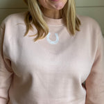 blushing horseshoe sweatshirt