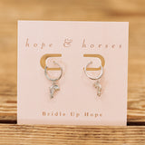 horse head huggie earrings