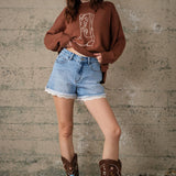 Lace Hem Light Wash Denim Shorts