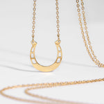 hope in a horseshoe necklace