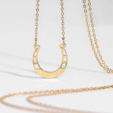 hope in a horseshoe necklace