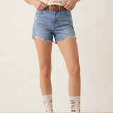 Bridle Up Hope Shop Ain't My First Rodeo crew socks in marshmallow bamboo blend with pink accents on a model