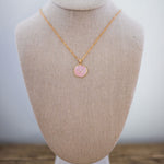 pink horseshoe pendant